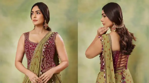 Mrunal’s pairing of an olive green saree with a beautifully embroidered burgundy blouse proved