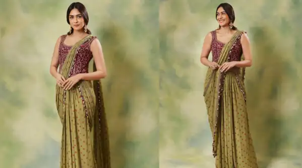 Mrunal’s pairing of an olive green saree with a beautifully embroidered burgundy blouse proved