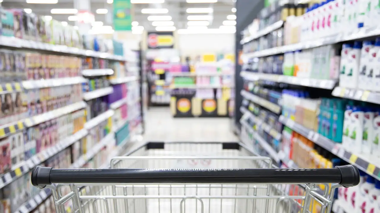 Milk arrives through the back of the store, moves into cold storage, and is stocked in coolers