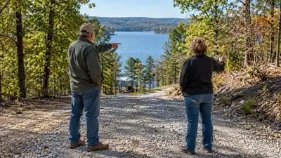 An Arkansas couple said their land was reachable only by boat across Beaver Lake