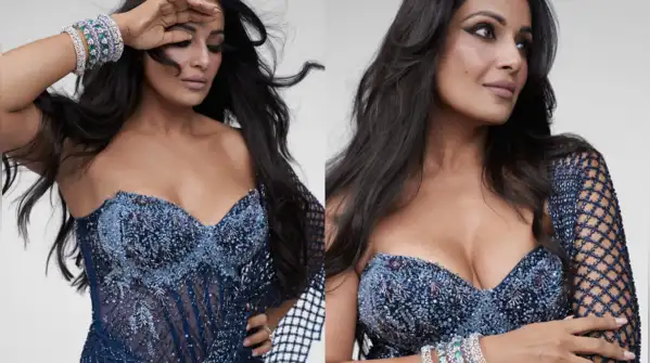 Bipasha Basu looked amazing in a midnight blue Gaurav Gupta saree gown, combining the beauty