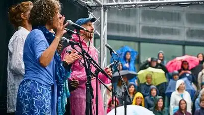 In 2026, Sing for Water marks 25 years of bringing choirs together beside the River Thames