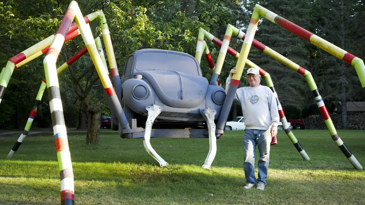 A Pennsylvania man started welding old car parts into sculptures in 1988; his Erie front yard now