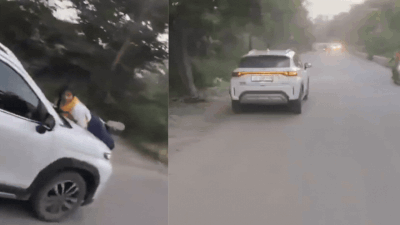 Watch: Woman catches husband with lover, clings to car bonnet as he tries to kill