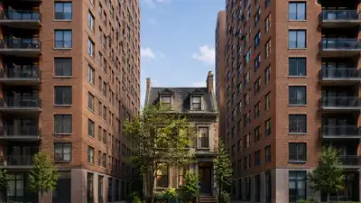 In 1916, a New York widow raising five children refused to sell her Manhattan row house; developers