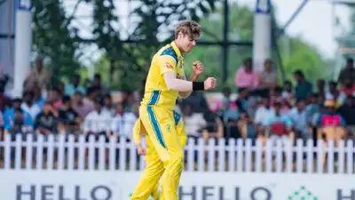 Spencer Johnson celebrates after taking a wicket