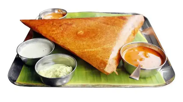When the surface is too cool, the batter steams instead of crisping, and the dosa turns soft
