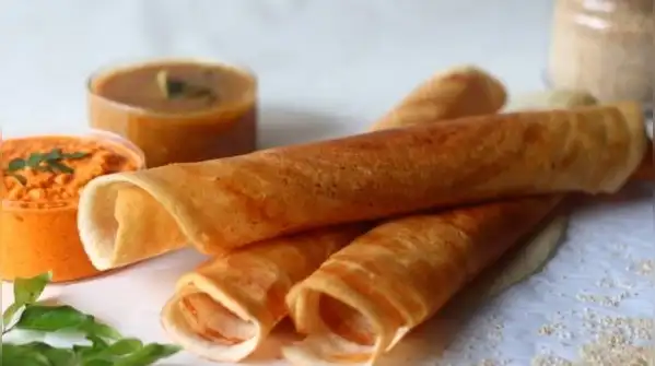 When the surface is too cool, the batter steams instead of crisping, and the dosa turns soft