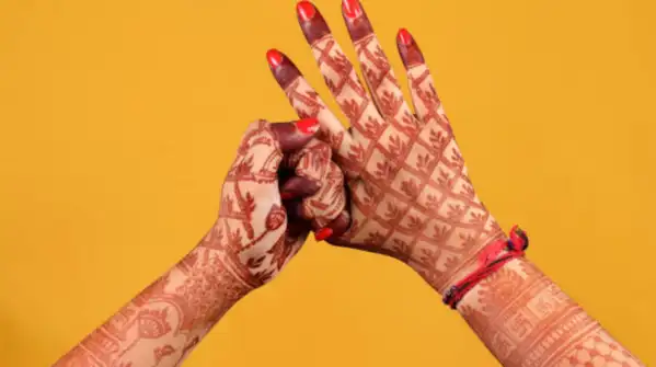 “Create a graceful Navratri mehendi design for both hands featuring detailed lotus flowers