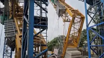 Two workers were killed and three others injured after a tower crane toppled at an MHADA