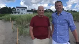 Dick Hill (left) and his son Clark Hill at their cottage on Popham Beach Estates