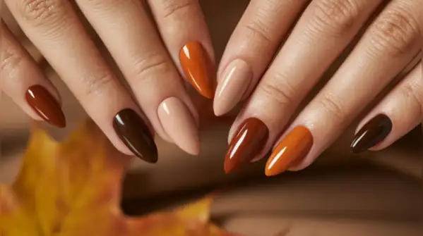 Halloween is the right occasion to try darker nail shades with special effects and the right