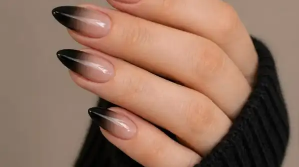 Halloween is the right occasion to try darker nail shades with special effects and the right