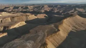 Utah approved blasting 100-foot canyon cliffs to widen a 5.3-mile road for oil trucks; after two