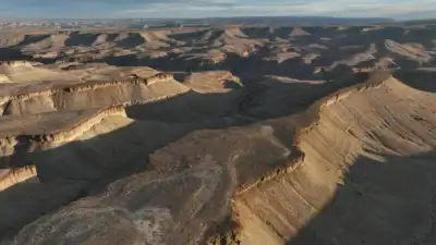 Utah approved blasting 100-foot canyon cliffs to widen a 5.3-mile road for oil trucks; after two