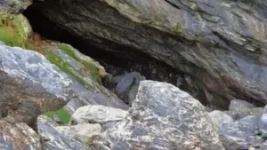 Cornwall's Holywell Cave, known for its colourful rock formations and appearance in Poldark