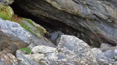 Cornwall's Holywell Cave, known for its colourful rock formations and appearance in Poldark