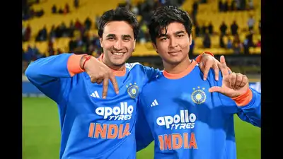 India's Abhishek Sharma, left, and Vaibhav Sooryavanshi gesture after winning during the third