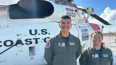 A 24-year-old US Coast Guard swimmer spent two hours in darkness and 6-to-8-foot waves rescuing 16