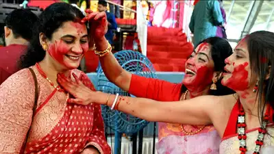 Married women from the Bengali community participate in Sindoor Utsav during Dussehra