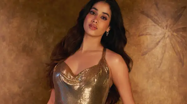 Janhvi Kapoor turns up the heat in a gold backless dress on 'Koffee With Karan's couch — Rapid-fire