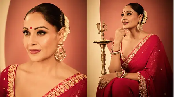 Adopting the most classic festive colours of red and gold, she enhanced her Durga Puja