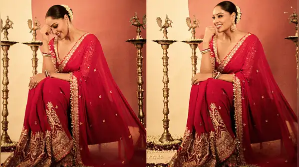 Adopting the most classic festive colours of red and gold, she enhanced her Durga Puja