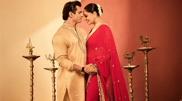 Adopting the most classic festive colours of red and gold, she enhanced her Durga Puja