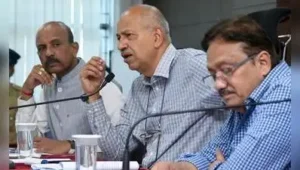 KERC chairman P Ravikumar (centre) chairs a public hearing: The wider industry impact