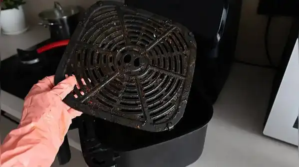 Always switch off and unplug the air fryer and let it cool completely before cleaning
