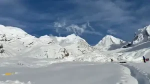 Rescue workers search for survivors after an avalanche buried the Himlung base camp, Nepal —