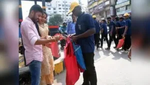 Students of SAC ITI distribute cloth bags made from old clothes to public during Gandhi Jayanti