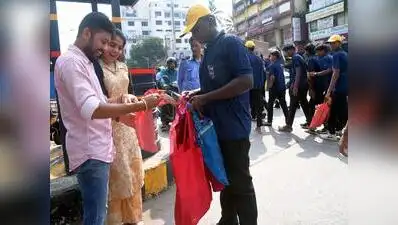Students of SAC ITI distribute cloth bags made from old clothes to public during Gandhi Jayanti