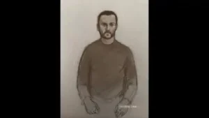 This is a court artist sketch by Elizabeth Cook of Royal Navy sailor Teddy Young appearing