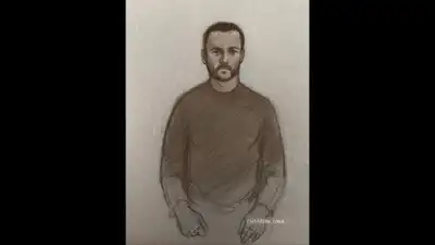 This is a court artist sketch by Elizabeth Cook of Royal Navy sailor Teddy Young appearing