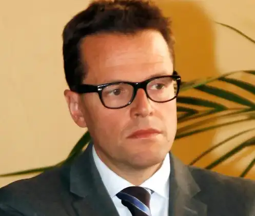 Italian banker accidentally dropped to death when thugs were dangling him out of his office